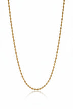 Lustre Twist Chain — Gold fine chain necklace champagne gold-tone on clean white background, product flat lay, ZARIÉ fine jewellery SÉRÉNITÉ collection