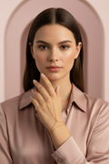 Minimal Bead Handpiece- Gold fine jewellery piece champagne gold-tone lifestyle shot worn on model against neutral background, ZARIÉ fine jewellery SÉRÉNITÉ collection