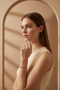Multi-Strand Bead Bracelet delicate bracelet lifestyle shot worn on model against neutral background, ZARIÉ fine jewellery HARMONIE collection