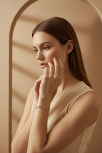 Multi-Strand Bead Bracelet delicate bracelet lifestyle shot worn on model against neutral background, ZARIÉ fine jewellery HARMONIE collection