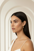 Orbit Charm Hoop Earrings- Gold hoop earrings champagne gold-tone lifestyle shot worn on model against neutral background, ZARIÉ fine jewellery LUMIÈRE collection