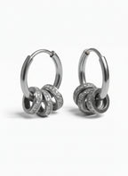 Orbit Charm Hoop Earrings – Silver hoop earrings silver-tone on clean white background, product flat lay, ZARIÉ fine jewellery ÉLORA collection