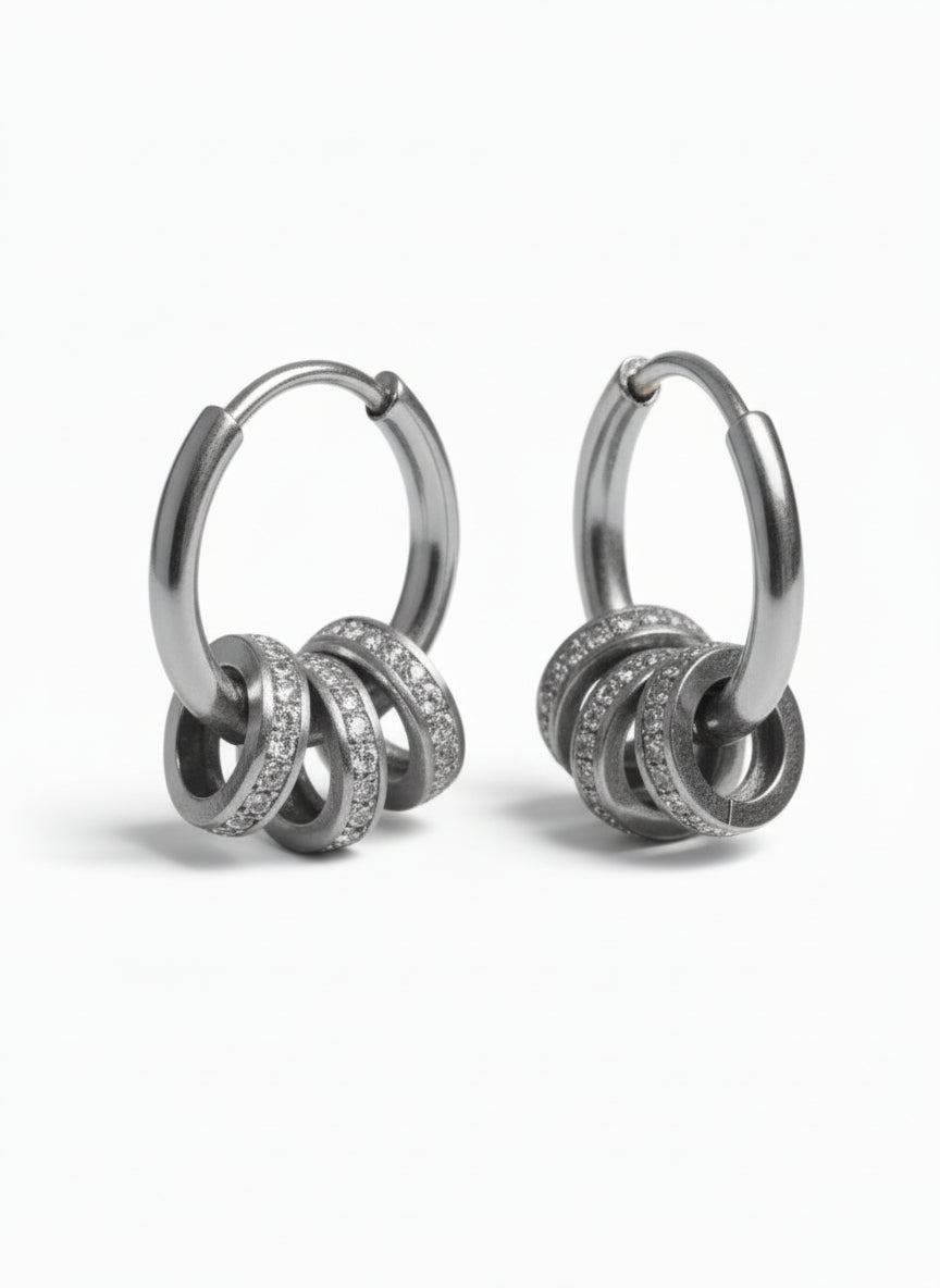 Orbit Charm Hoop Earrings – Silver hoop earrings silver-tone on clean white background, product flat lay, ZARIÉ fine jewellery ÉLORA collection