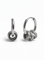 Orbit Charm Hoop Earrings – Silver hoop earrings silver-tone on clean white background, product flat lay, ZARIÉ fine jewellery ÉLORA collection