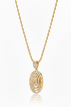 Orbit Halo Pendant Necklace — Gold pendant necklace champagne gold-tone additional product view on soft beige background, ZARIÉ fine jewellery LUMIÈRE collection