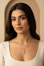 Orbit Halo Pendant Necklace — Gold pendant necklace champagne gold-tone additional product view on soft beige background, ZARIÉ fine jewellery LUMIÈRE collection