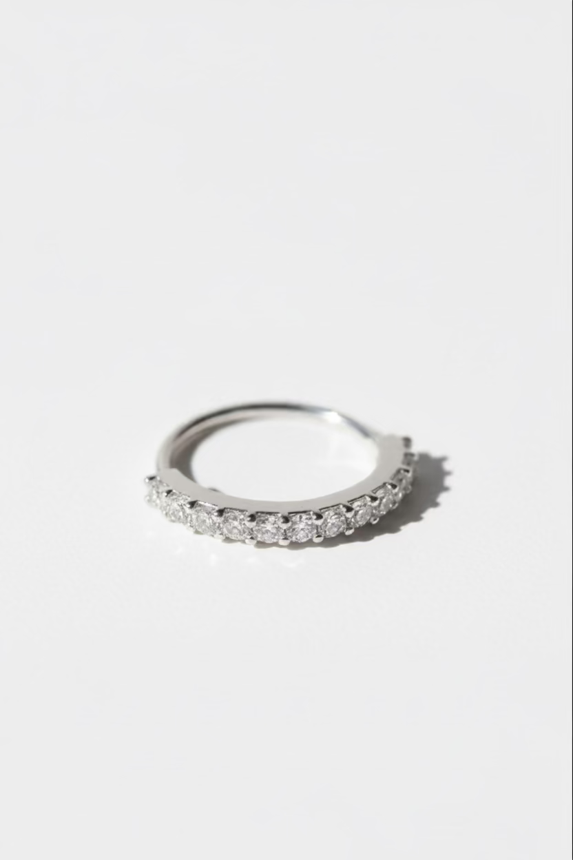 Pavé Arc Nose Ring — Silver open band ring silver-tone with pavé stone setting lifestyle shot worn on model against neutral background, ZARIÉ fine jewellery ÉLORA collection