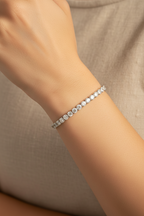 Pavé Line Bracelet – Silver delicate bracelet silver-tone with pavé stone setting lifestyle shot worn on model against neutral background, ZARIÉ fine jewellery ÉLORA collection