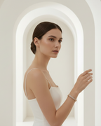 Pavé Marquise Link Bracelet delicate bracelet with pavé stone setting lifestyle shot worn on model against neutral background, ZARIÉ fine jewellery LUMIÈRE collection