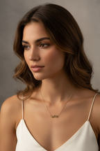 Perched Birds Necklace — Gold fine chain necklace champagne gold-tone lifestyle shot worn on model against neutral background, ZARIÉ fine jewellery SÉRÉNITÉ collection