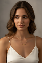 Perched Birds Necklace — Gold fine chain necklace champagne gold-tone lifestyle shot worn on model against neutral background, ZARIÉ fine jewellery SÉRÉNITÉ collection