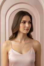 Perched Birds Necklace — Silver fine chain necklace silver-tone lifestyle shot worn on model against neutral background, ZARIÉ fine jewellery ÉLORA collection