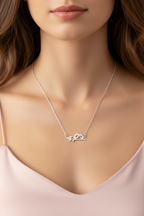 Perched Birds Necklace — Silver fine chain necklace silver-tone lifestyle shot worn on model against neutral background, ZARIÉ fine jewellery ÉLORA collection