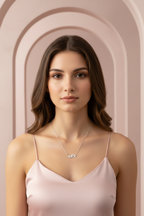 Perched Birds Necklace — Silver fine chain necklace silver-tone lifestyle shot worn on model against neutral background, ZARIÉ fine jewellery ÉLORA collection