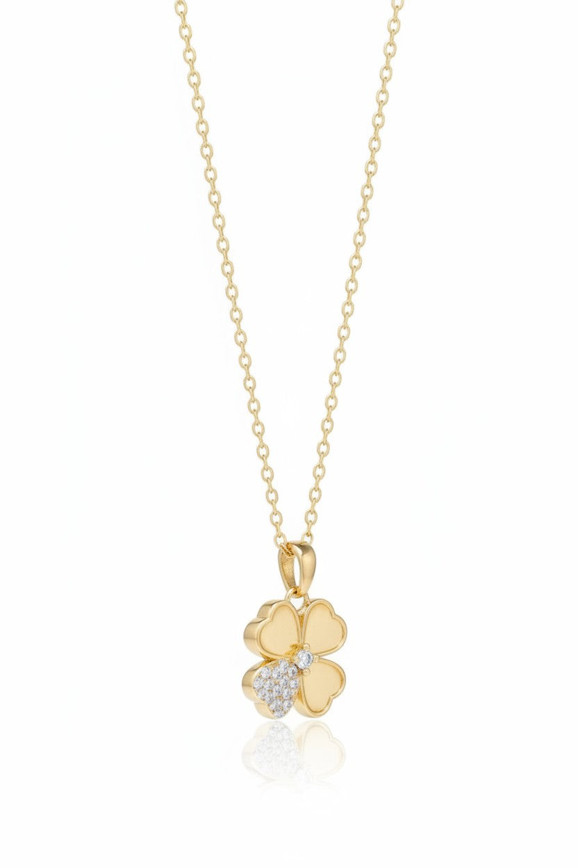 Petite Clover Necklace — Gold fine chain necklace champagne gold-tone four-leaf clover motif additional product view on soft beige background, ZARIÉ fine jewellery HARMONIE collection