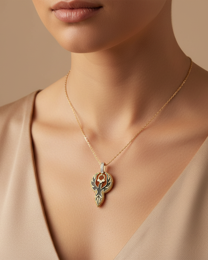 Phoenix Charm Pendant – Gold pendant necklace champagne gold-tone lifestyle shot worn on model against neutral background, ZARIÉ fine jewellery HARMONIE collection