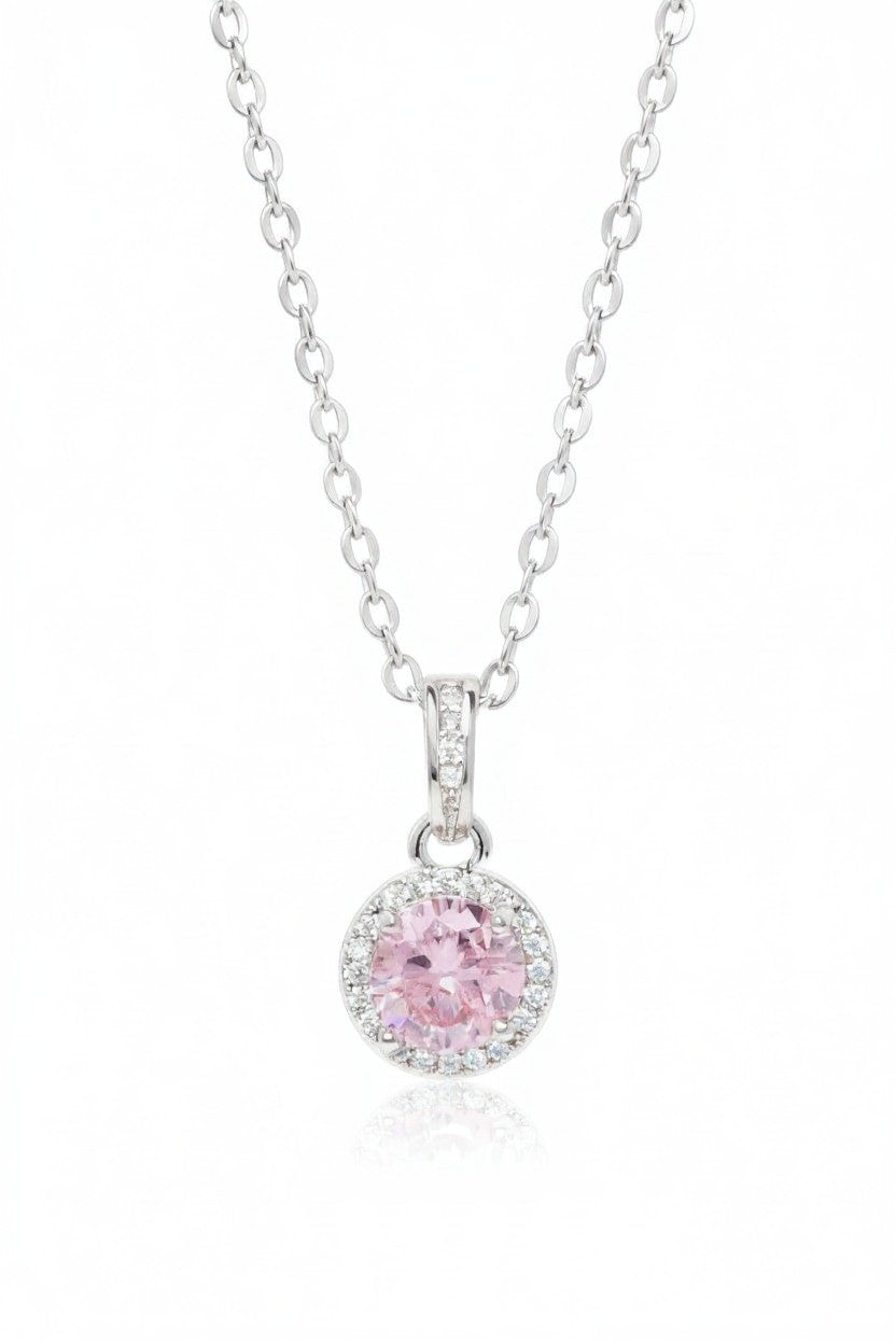 Necklace with a pink pendant on a white background