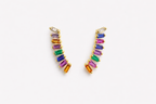 Multicolored gemstone earrings on a white background