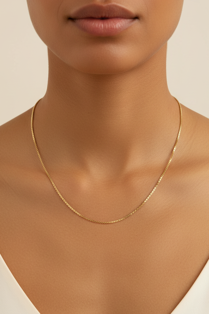 Ripple Chain Necklace fine chain necklace lifestyle shot worn on model against neutral background, ZARIÉ fine jewellery SÉRÉNITÉ collection