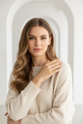 Sleek Aura Line Handpiece fine jewellery piece lifestyle shot worn on model against neutral background, ZARIÉ fine jewellery ÉLORA collection