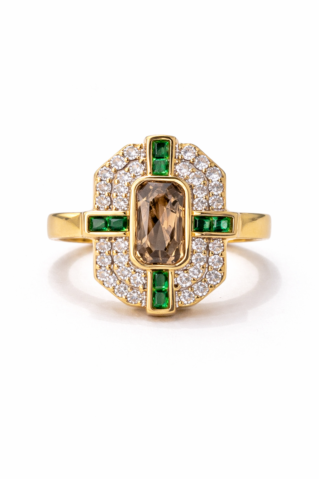 Gold ring with green gemstones and diamonds on a white background
