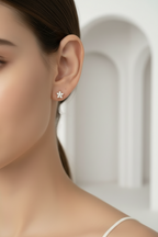Star Cluster Stud Earrings – Classic stud earrings lifestyle shot worn on model against neutral background, ZARIÉ fine jewellery LUMIÈRE collection