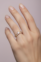 Subtle Accent Ring open band ring lifestyle shot worn on model against neutral background, ZARIÉ fine jewellery RAYONNE collection