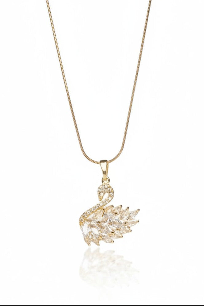 Swan Crest Necklace — Gold fine chain necklace champagne gold-tone on clean white background, product flat lay, ZARIÉ fine jewellery LUMIÈRE collection