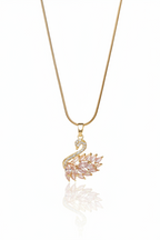 Swan Crest Necklace — Rosée fine chain necklace lifestyle shot worn on model against neutral background, ZARIÉ fine jewellery RAYONNE collection