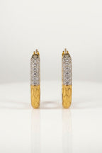 Textured Pavé Oval Hoop Earrings hoop earrings with pavé stone setting on clean white background, product flat lay, ZARIÉ fine jewellery LUMIÈRE collection