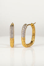 Textured Pavé Oval Hoop Earrings hoop earrings with pavé stone setting on clean white background, product flat lay, ZARIÉ fine jewellery LUMIÈRE collection