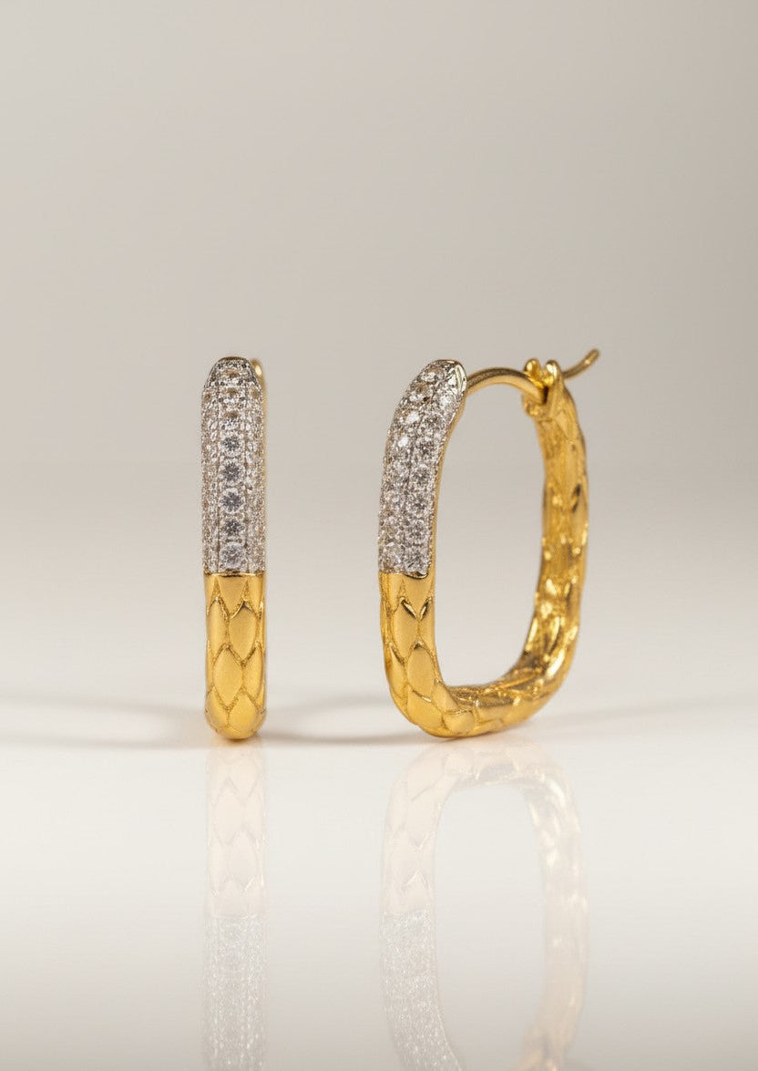 Textured Pavé Oval Hoop Earrings hoop earrings with pavé stone setting lifestyle shot worn on model against neutral background, ZARIÉ fine jewellery LUMIÈRE collection
