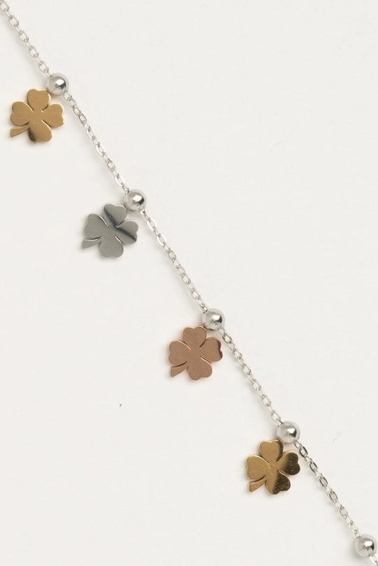 Tri-Tone Clover Chain Bracelet fine chain necklace four-leaf clover motif on clean white background, product flat lay, ZARIÉ fine jewellery HARMONIE collection