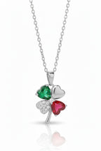 Verdant Clover Necklace — Silver fine chain necklace silver-tone four-leaf clover motif on clean white background, product flat lay, ZARIÉ fine jewellery RAYONNE collection