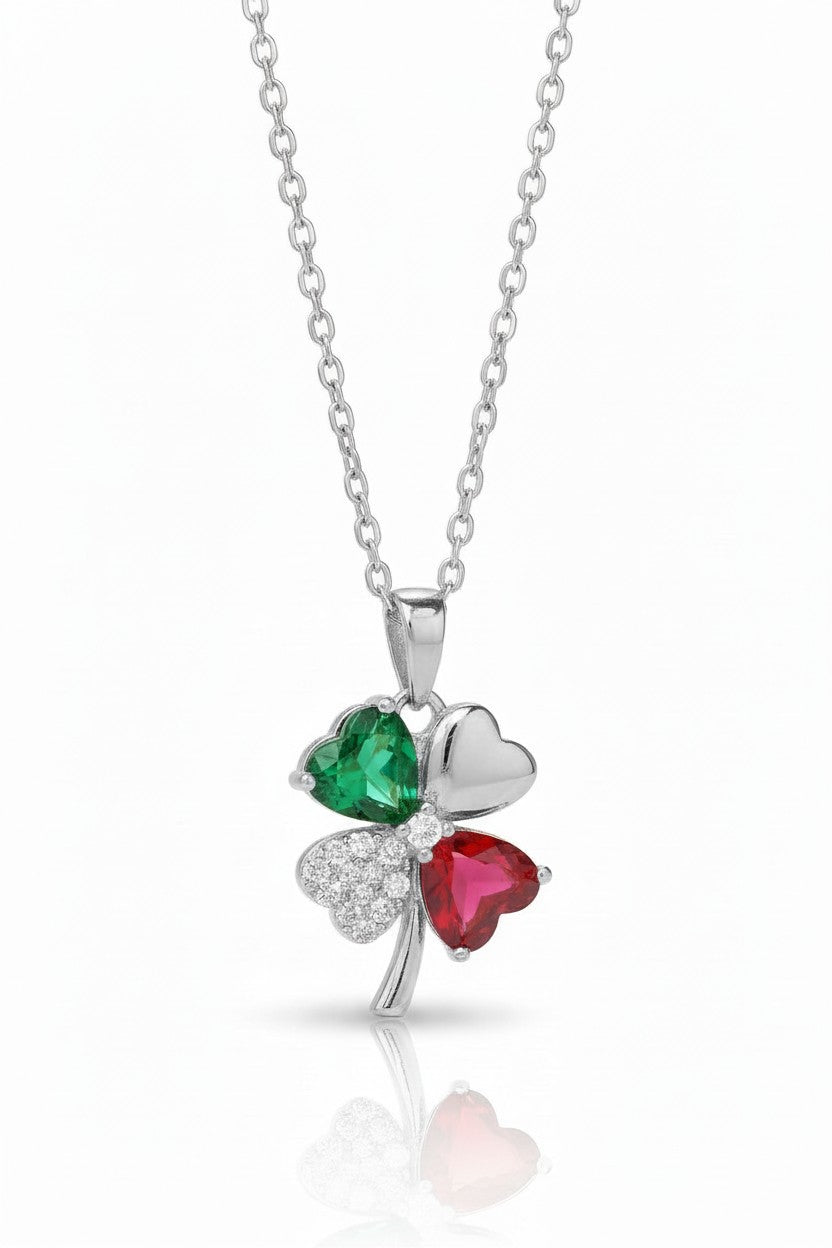 Verdant Clover Necklace — Silver fine chain necklace silver-tone four-leaf clover motif on clean white background, product flat lay, ZARIÉ fine jewellery RAYONNE collection
