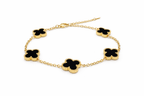 Verre Clover Bracelet — Black on Gold delicate bracelet champagne gold-tone four-leaf clover motif on clean white background, product flat lay, ZARIÉ fine jewellery SÉRÉNITÉ collection