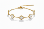 Gold bracelet with clover-shaped charms on a white background