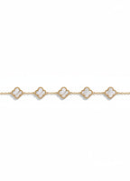 Gold bracelet with heart-shaped charms on a white background