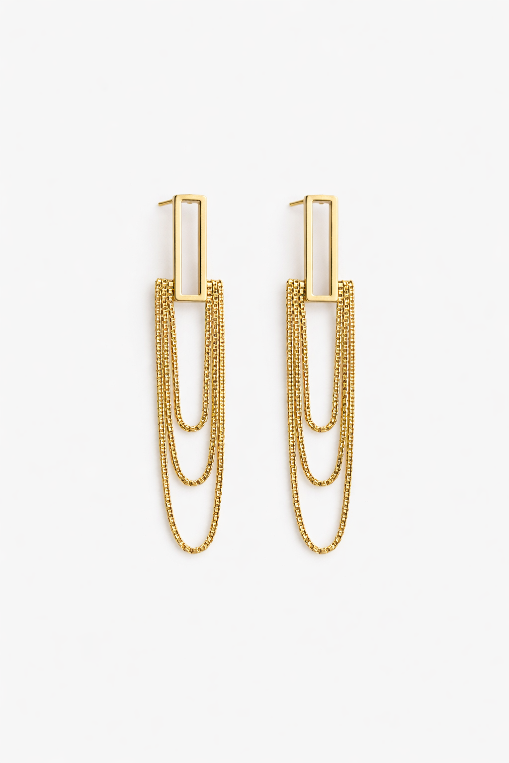 Gold chain earrings on a white background