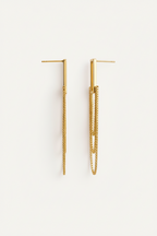 Gold hoop earrings on a white background