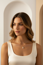 Élise Halo Necklace fine chain necklace lifestyle shot worn on model against neutral background, ZARIÉ fine jewellery LUMIÈRE collection